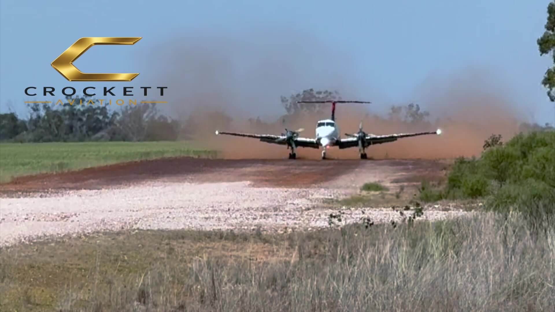 King Air B200 on an unsealed strip with dust from both propellers